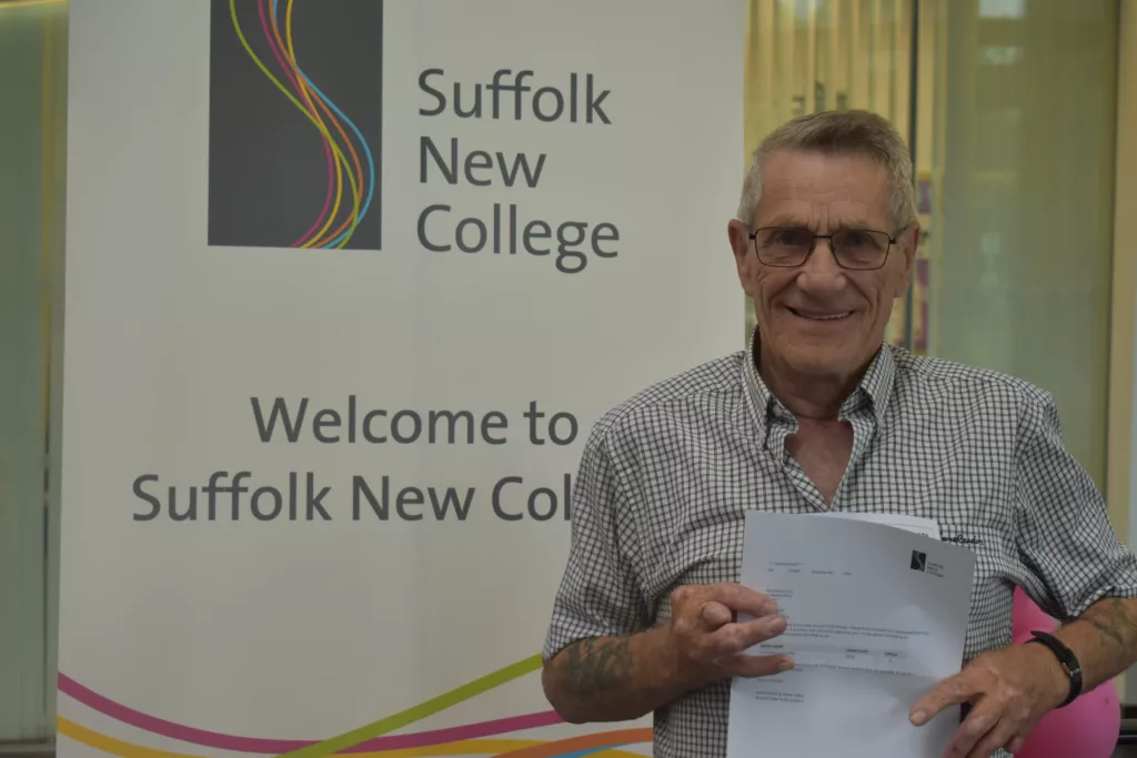 Danny Davey from Ipswich with his certificate showing he got a grade 6 in English at the age of 73