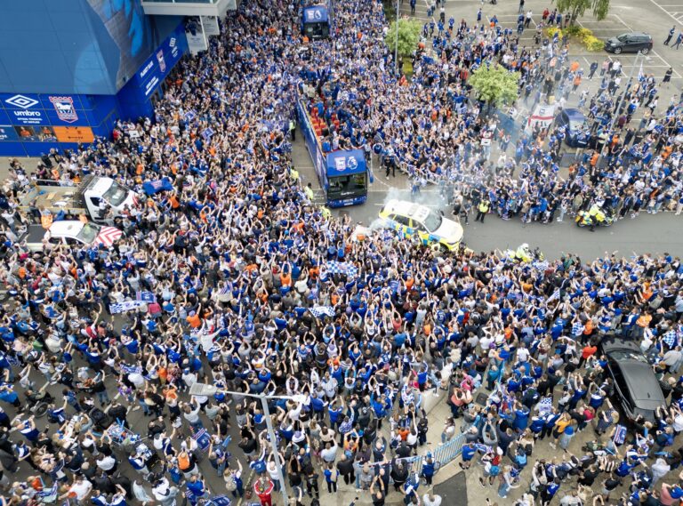 Ipswich unites for Premier League promotion parade as the whole town turns blue