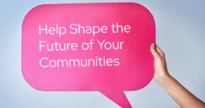 pink speech bubble being held by a single hand, with 'help shape the future of your communities' in it